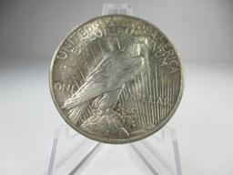 h-1 AU 1924-P Peace Silver Dollar.