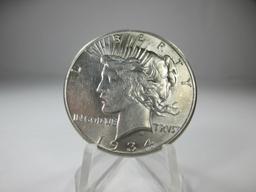 jr-26 Gem BU 1934-P Peace Silver Dollar. Full mint luster and strong details on this RARE coin.