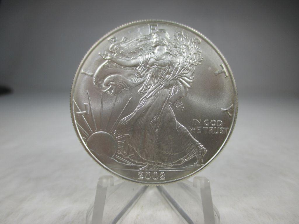 t-17 GEM BU 2002 American Silver Eagle right from the roll.