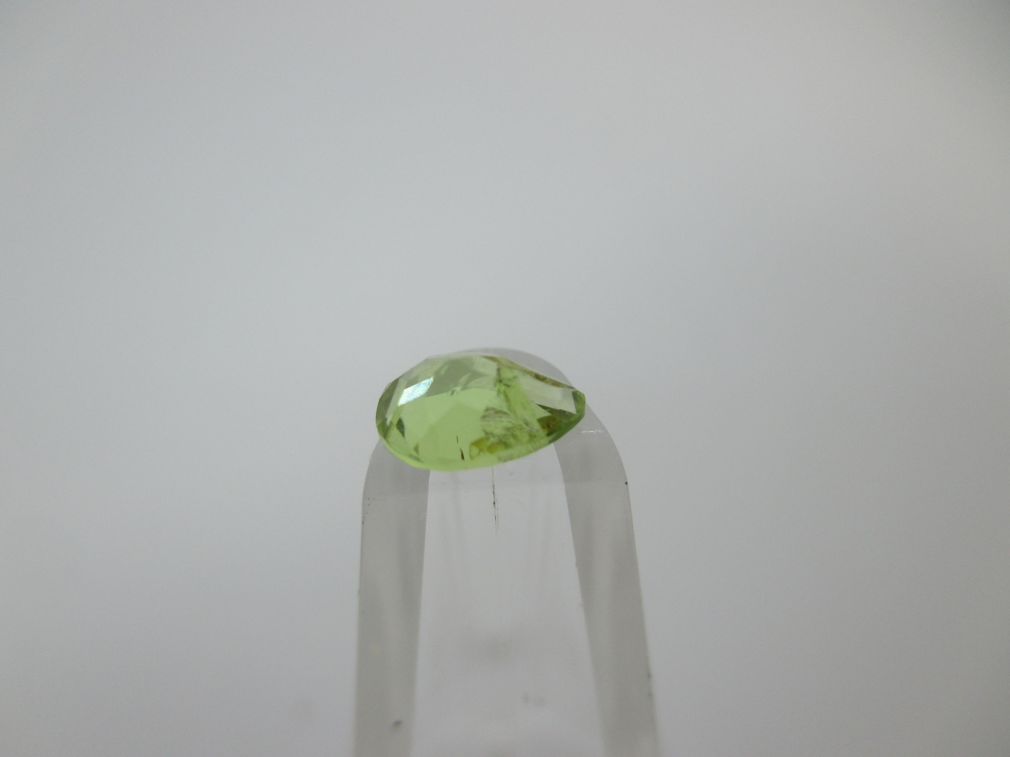 t-36 .75 Karat Pear Cut Paradot Gemstone GIA Certified