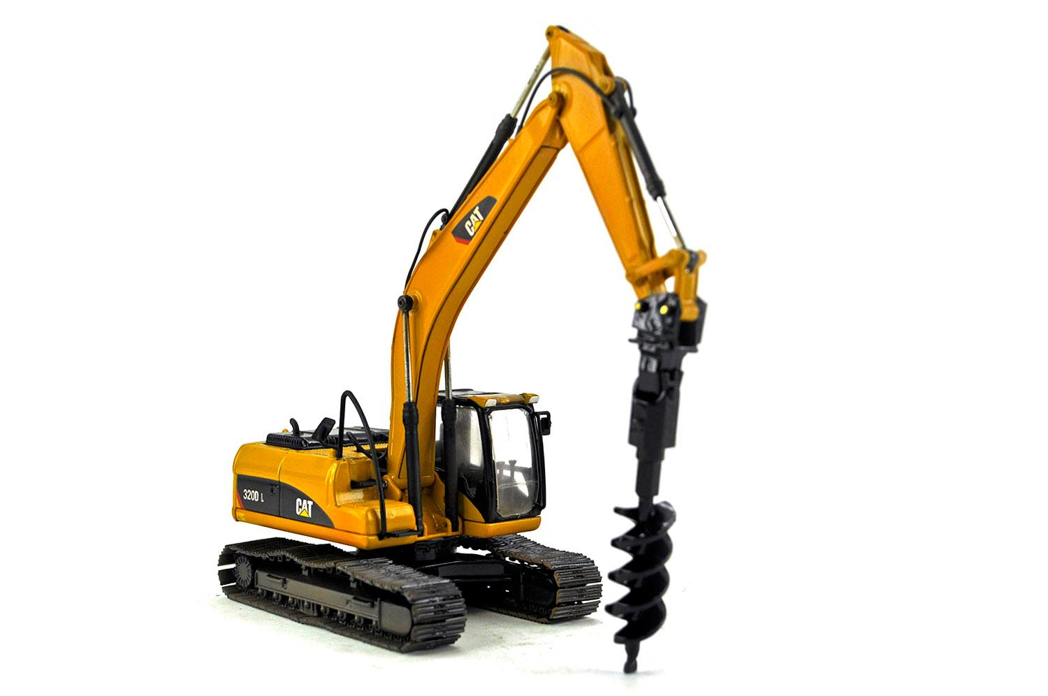 Caterpillar 320 Excavator w/Drill Attachment