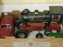 Box Including 2 Ertl Tractors,