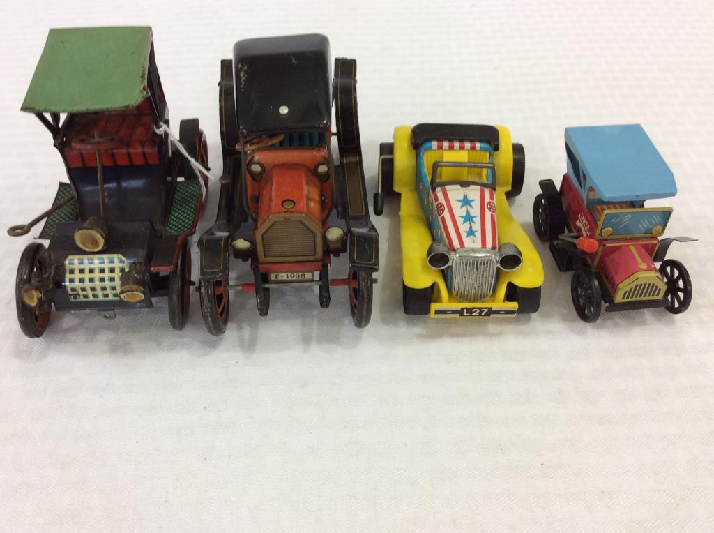 Lot of 4 Tin Lever Action Toy Cars-Most Made in