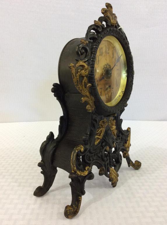 Ornate Iron Cherub Design Western Clock Mfg. Co