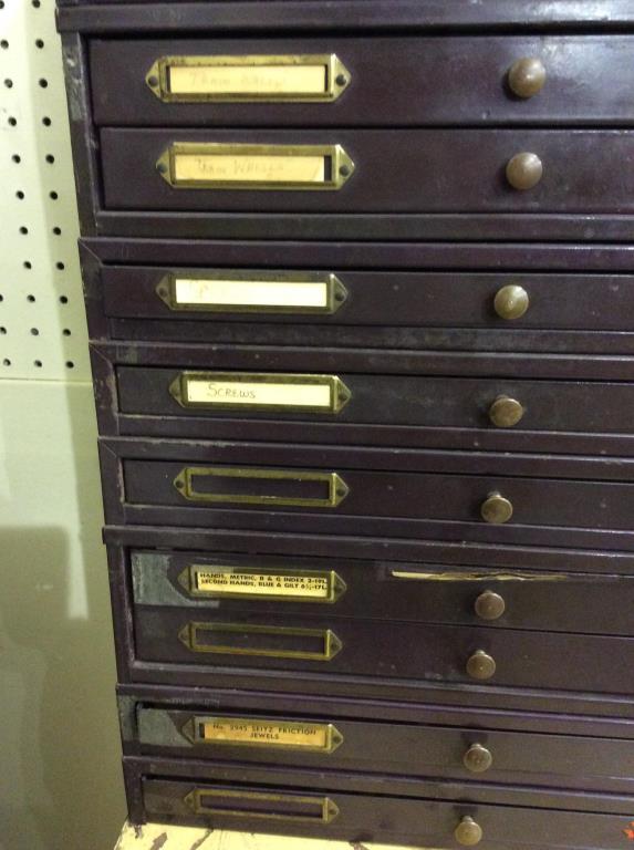 11 Drawer Metal Cabinet Filled w/ Watch & Clock