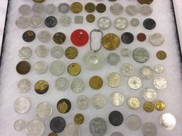 Collection of Over 100 Various Old Tokens