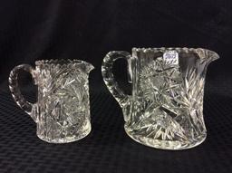 Lot of 2 Heavy Intricate Glass Pitchers