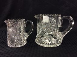 Lot of 2 Heavy Intricate Glass Pitchers