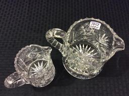 Lot of 2 Heavy Intricate Glass Pitchers