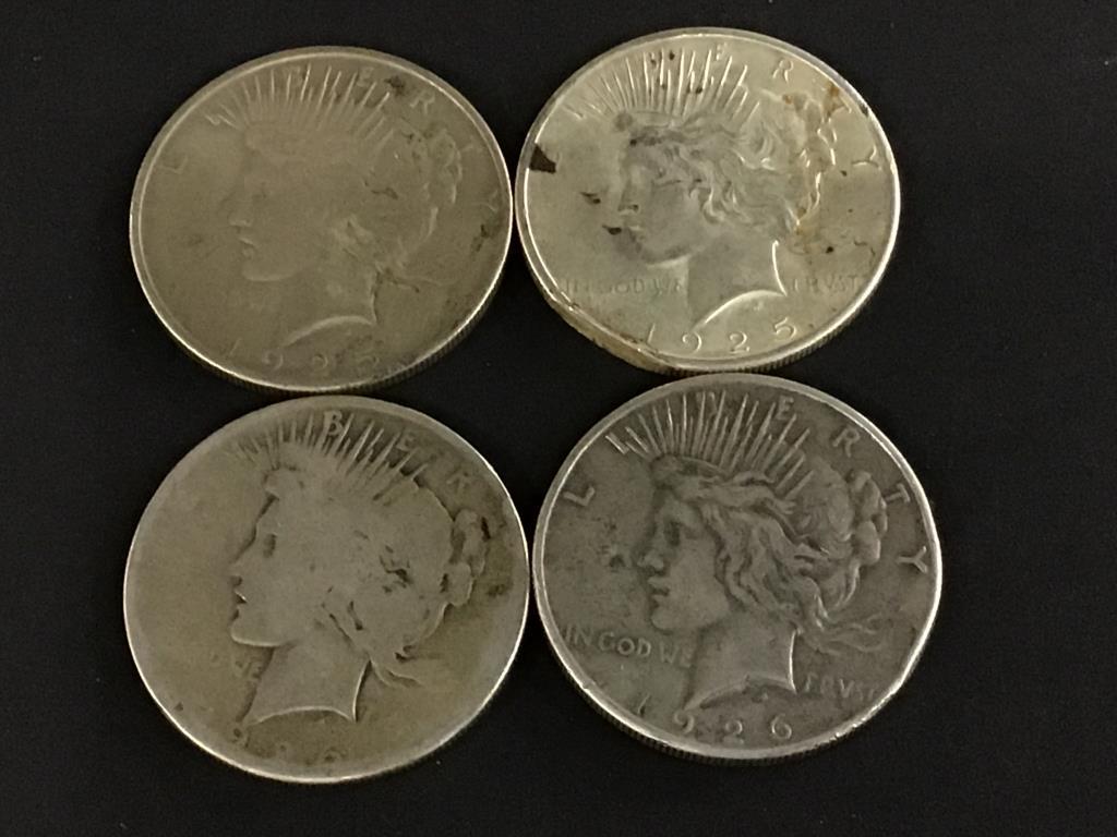 Collection of 16 Peace Silver Dollars Including