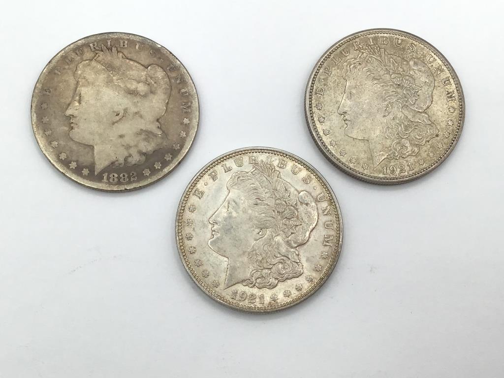 Collection of 7 Morgan Silver Dollars Including