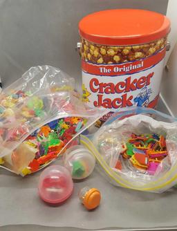 Cracker jack tin with 2 bags of charms