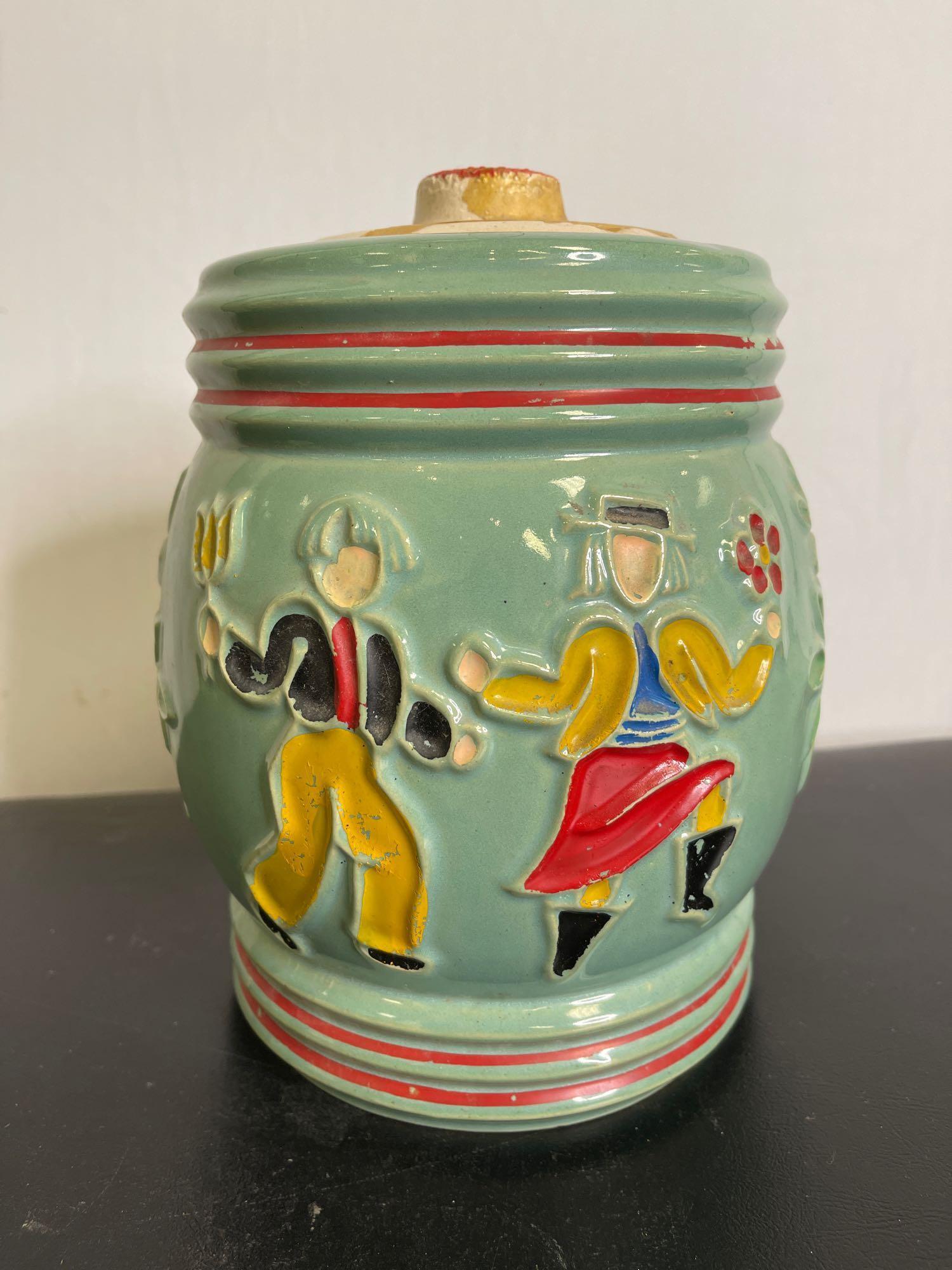 Vintage Red Wing Dutch Dancing Peasants Cookie Jar, lid repaired, 8.5" tall