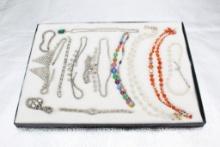 DISPLAY CASE OF VINTAGE COSTUME JEWELRY