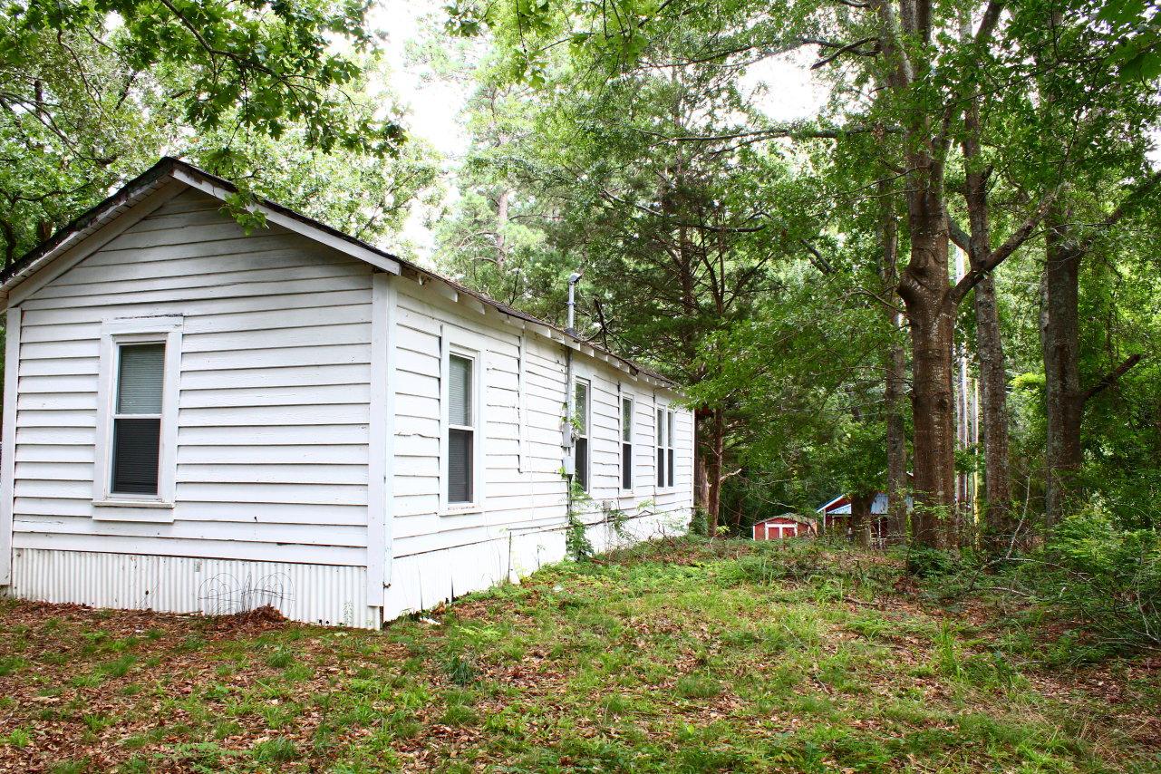 Elvis Presley's Home & 16.5 Acres Played on as a Child