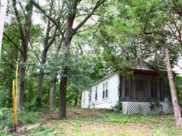 Elvis Presley's Home & 16.5 Acres Played on as a Child