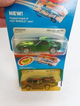 TWO (2) X The Money, 1983 Hot Wheels Ultra Hots, Unopened Incl. Predator and Sol-Aire CX-4.