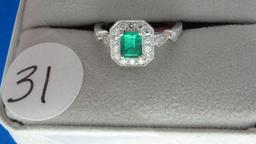 18K w/g .61ct Emerald Center and 28 Round Diamonds