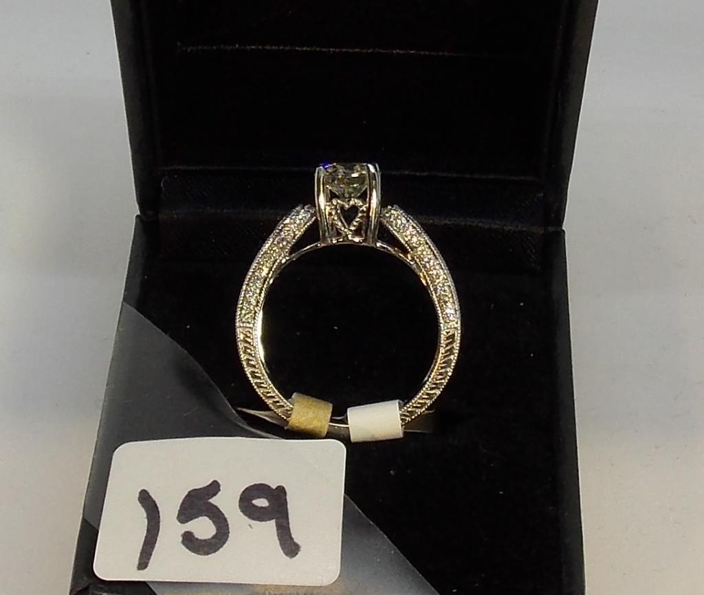 LADIES 18K W/G 1CT ROUND CENTER DIAMOND, WITH 1.34CT. v