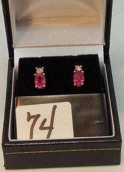 LADIES 10K Y/G OVAL RUBY & .04CT T.W. DIAMOND  EARRINGS