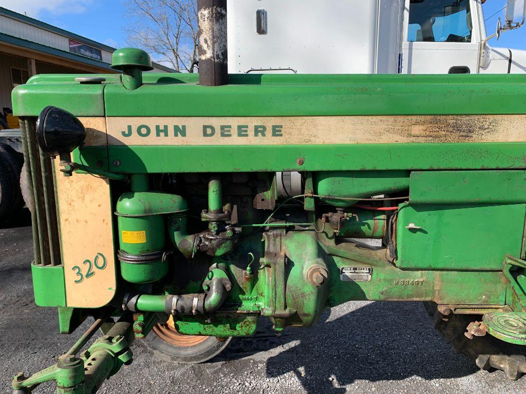 5 John Deere 320S Tractor