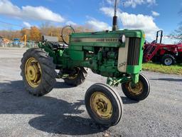 5 John Deere 320S Tractor