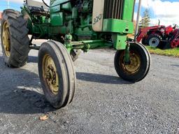 5 John Deere 320S Tractor