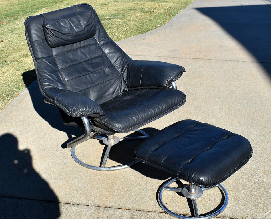 Modernist Black Leather Swivel Seat and Ottoman