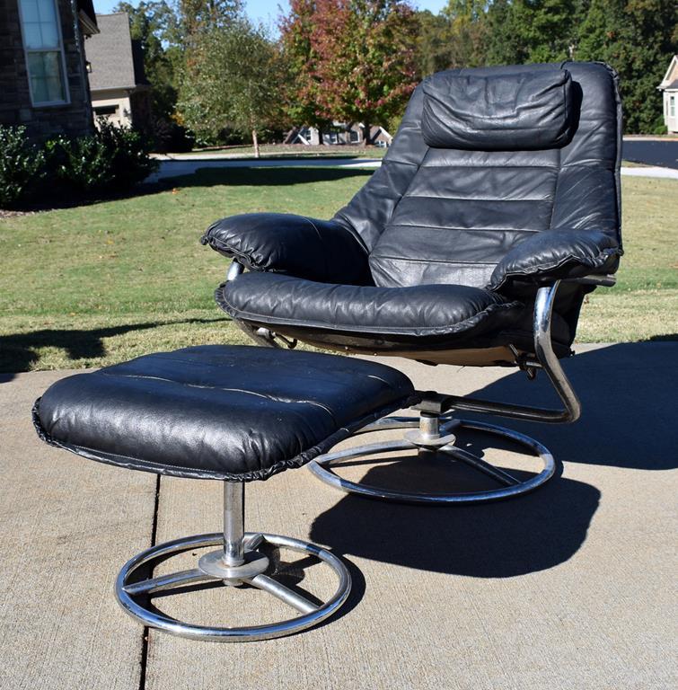 Modernist Black Leather Swivel Seat and Ottoman