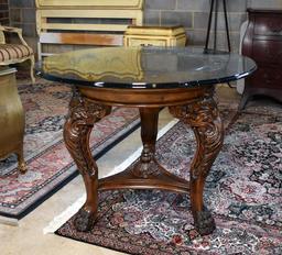 Remarkable Centerpiece Round Table with Heavy Carved Legs & Paw Feet, Heavy Glass Top