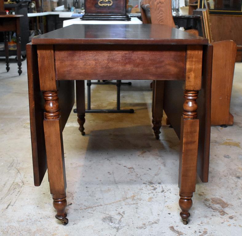 Antique Drop Leaf Cherry Dining Table with New York Legs, Brass Caster Feet