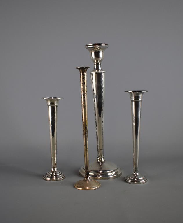 Lot of Weighted Sterling Silver: Three Bud Vases and a Candle Holder