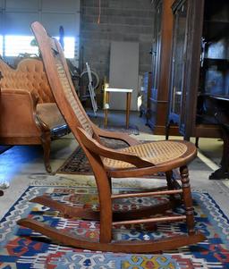 Comfortable Antique Oak Rocker with Caned Back and Seat