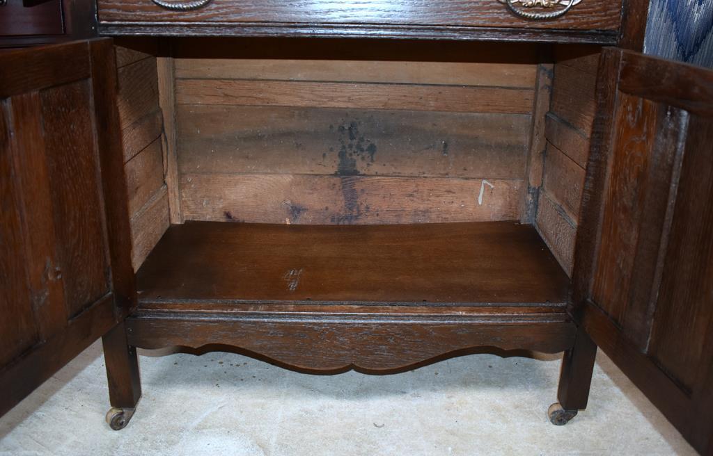 Antique Turn of 20th C. Oak Commode Cabinet with Caster Feet