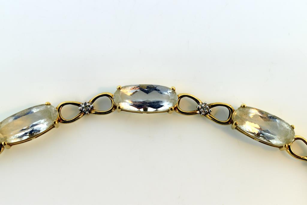 10K Gold and Colorless Stone & Diamond 7.5” Link Bracelet