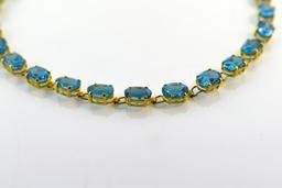 14K Gold and 20 Carat Blue Topaz 7.5” Link Bracelet