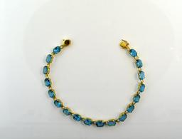 14K Gold and 20 Carat Blue Topaz 7.5” Link Bracelet