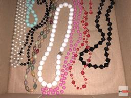 Jewelry - necklaces, 8 period plastic costume necklaces
