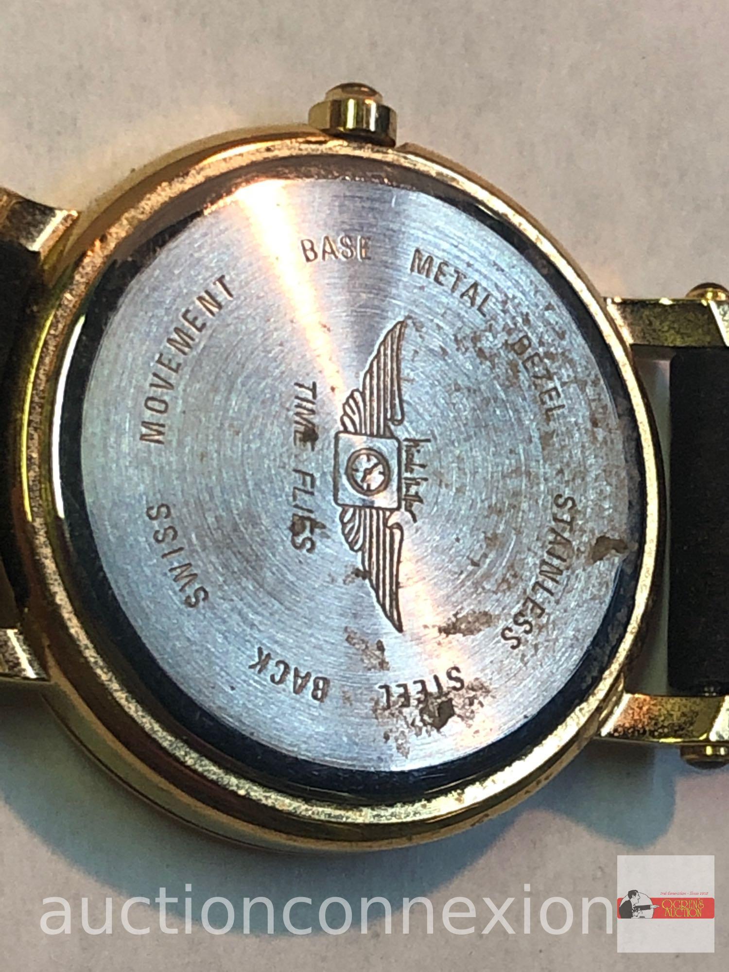 Wrist Watch - Nicole Miller, Roman numerals, Swiss movement, stainless steel back, metal bezel