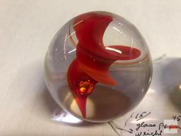 Paperweights - 2 art glass paperweights, red swirl 2.75"h, Yellow flower w/blue base 2.5"h