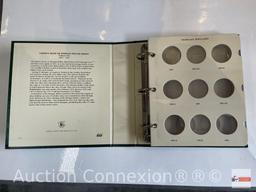 Coins - 1899o Silver Dollar, Morgan plus an empty Morgan Dollar storage binder for years 1892-1921