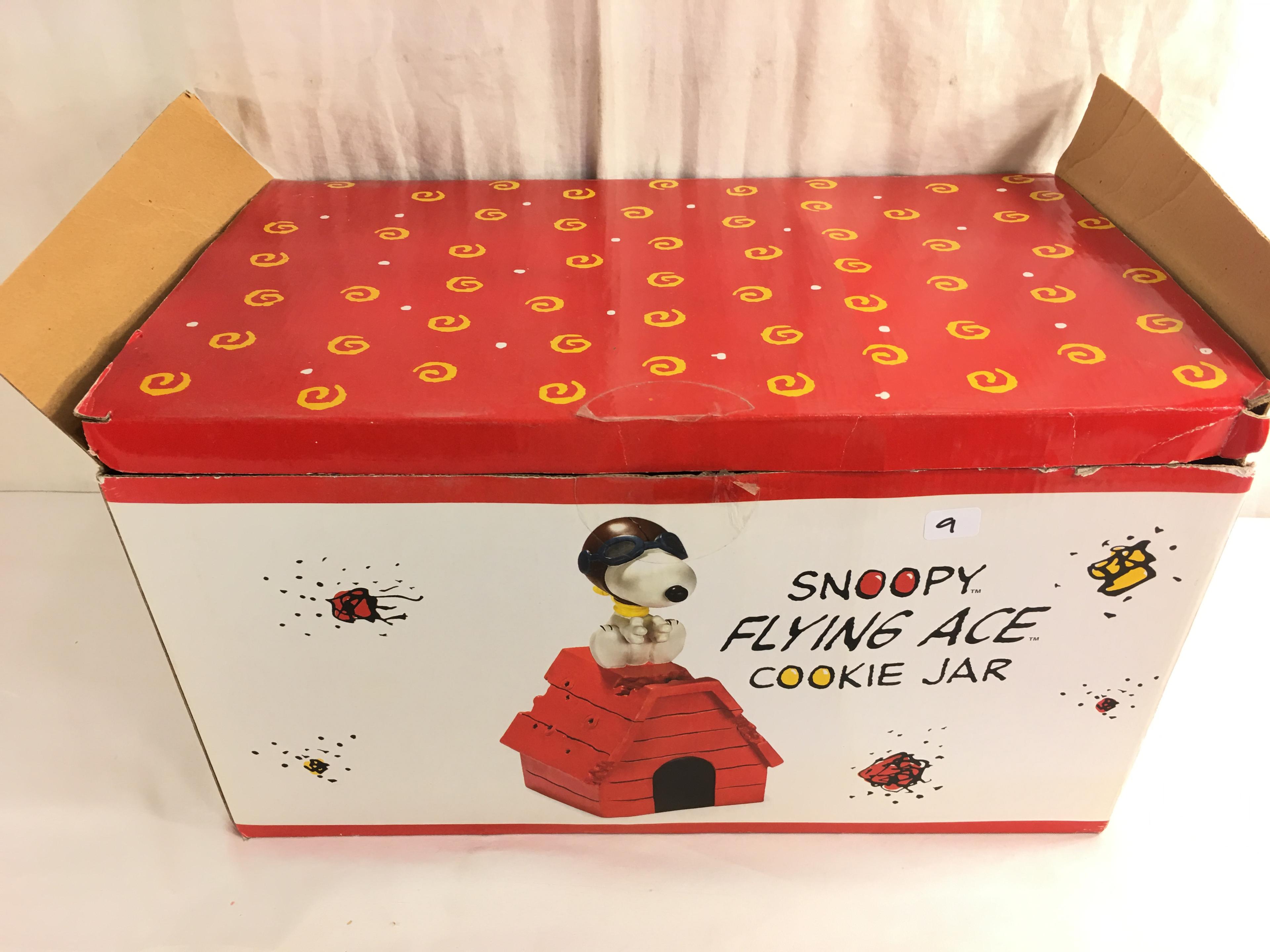 Collector Peanuts Snoopy Flying Ace Cookie Jar Box Size: 15.5x9.5x8.5" Box