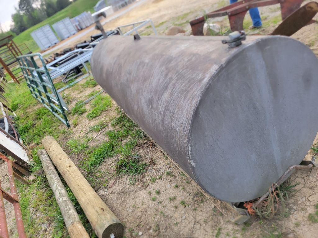 APPROX 500-600 GAL FUEL TANK WITH WORKING HAND PUMP