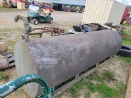 APPROX 500-600 GAL FUEL TANK WITH WORKING HAND PUMP