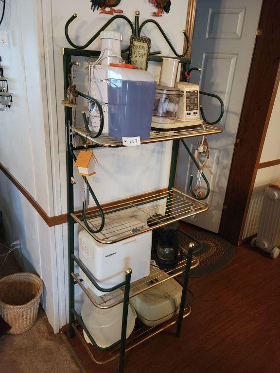 GREEN AND GOLD SHELF WITH KITCHEN APPLIANCES