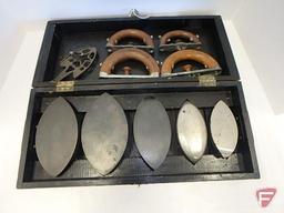 Enterprise set of sad irons in wooden box with dovetailed corners