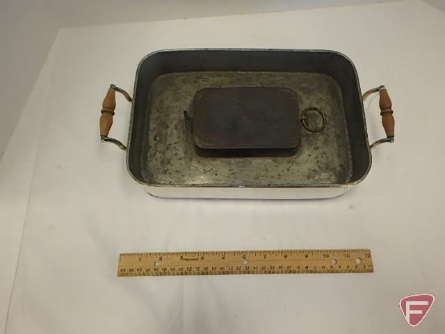 Silver chafing dish with bottom of sad iron used as heating element