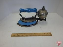 Coleman gas and kerosene irons; with box and framed advertising, All 5 pieces