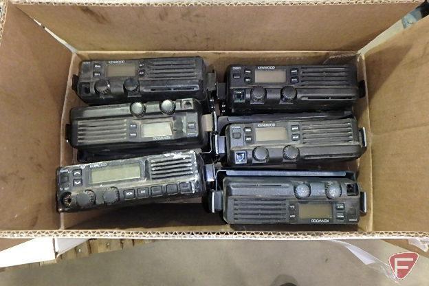 7 boxes of Motorola and Kenwood 2-way radios; fire extinguisher; first aid kit