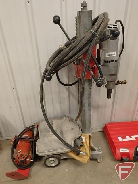 Milwaukee core drill 110 volt w/suction pump and base and extensions, water hose